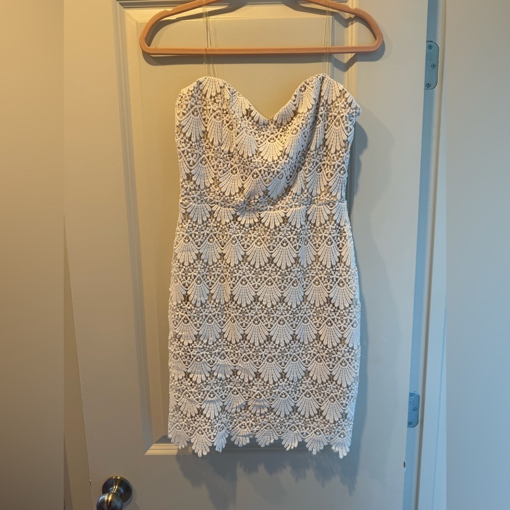 White mini dress with nude underlay